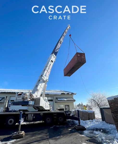 Crane lifting a 40' shipping Container